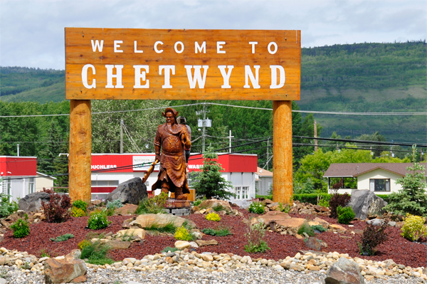 Welcome to Chetwynd sign and carvings
